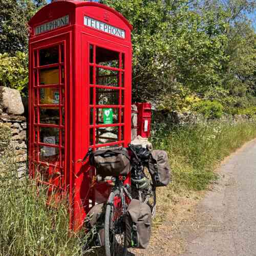 Land's End to John o'Groats - my Surly Disc Trucker, leaning on a typical British phone booth